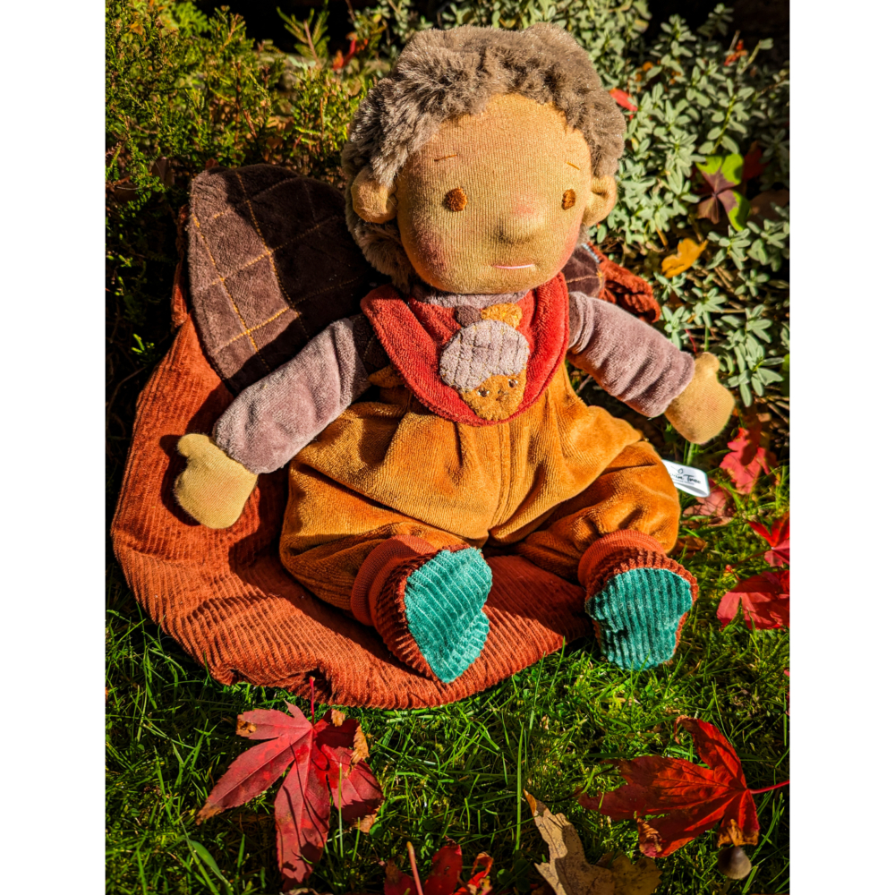 Acorn, a waldorf inspired doll and his acorn bag