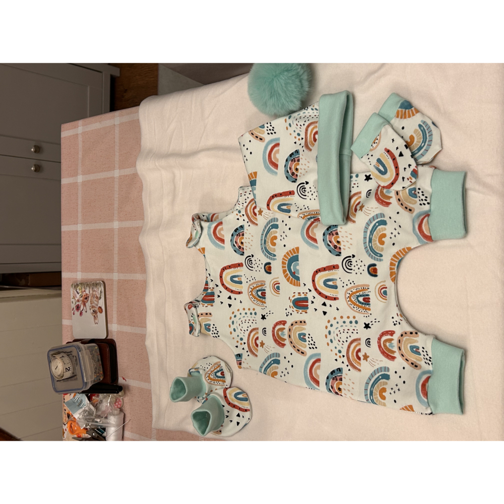 Baby’s sleep sacks and sleepy hat.