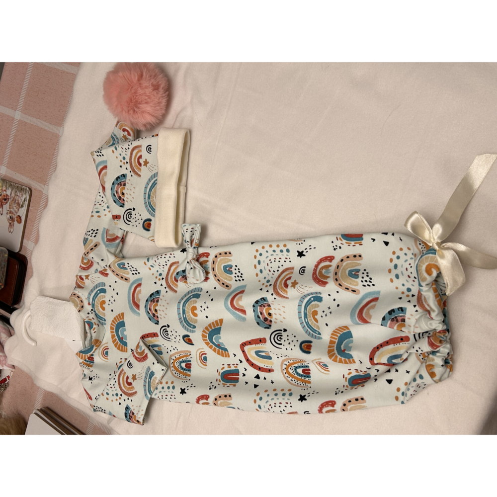 Baby’s sleep sacks and sleepy hat.