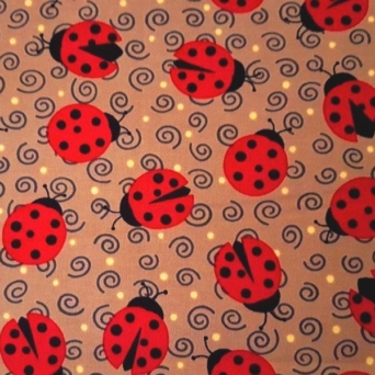 Esme Ladybugs on Light Brown Fabric