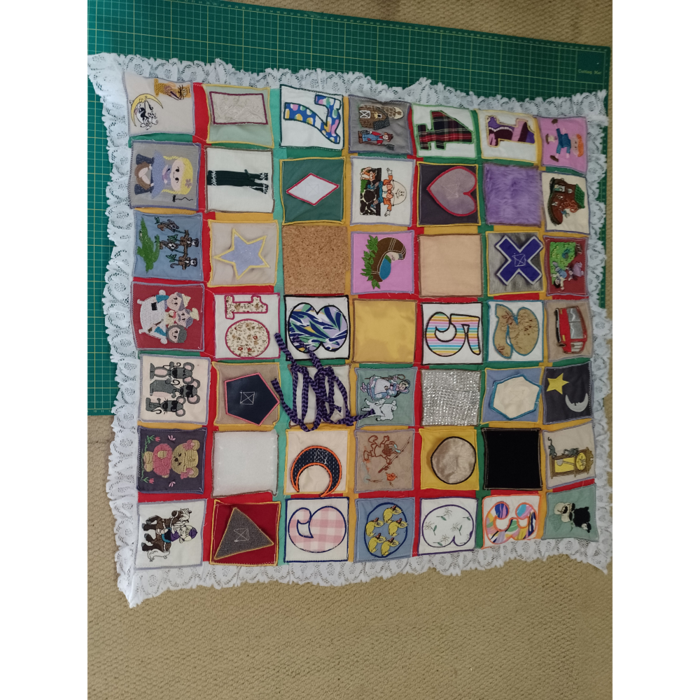 Lavender pouch, messenger bag, sensory mat and a nursery rhyme tummy mat