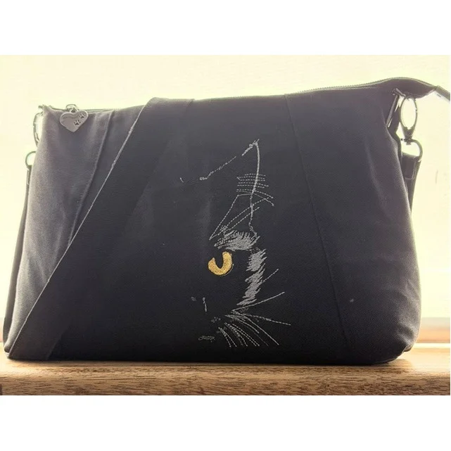 The cats on the bag